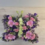 Rouwbloemstuk Izzy gemengde vlinder